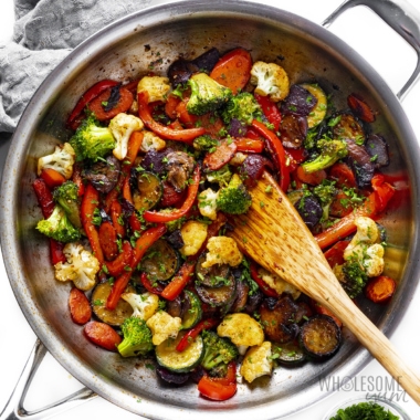 Sauteed vegetables in a skillet.