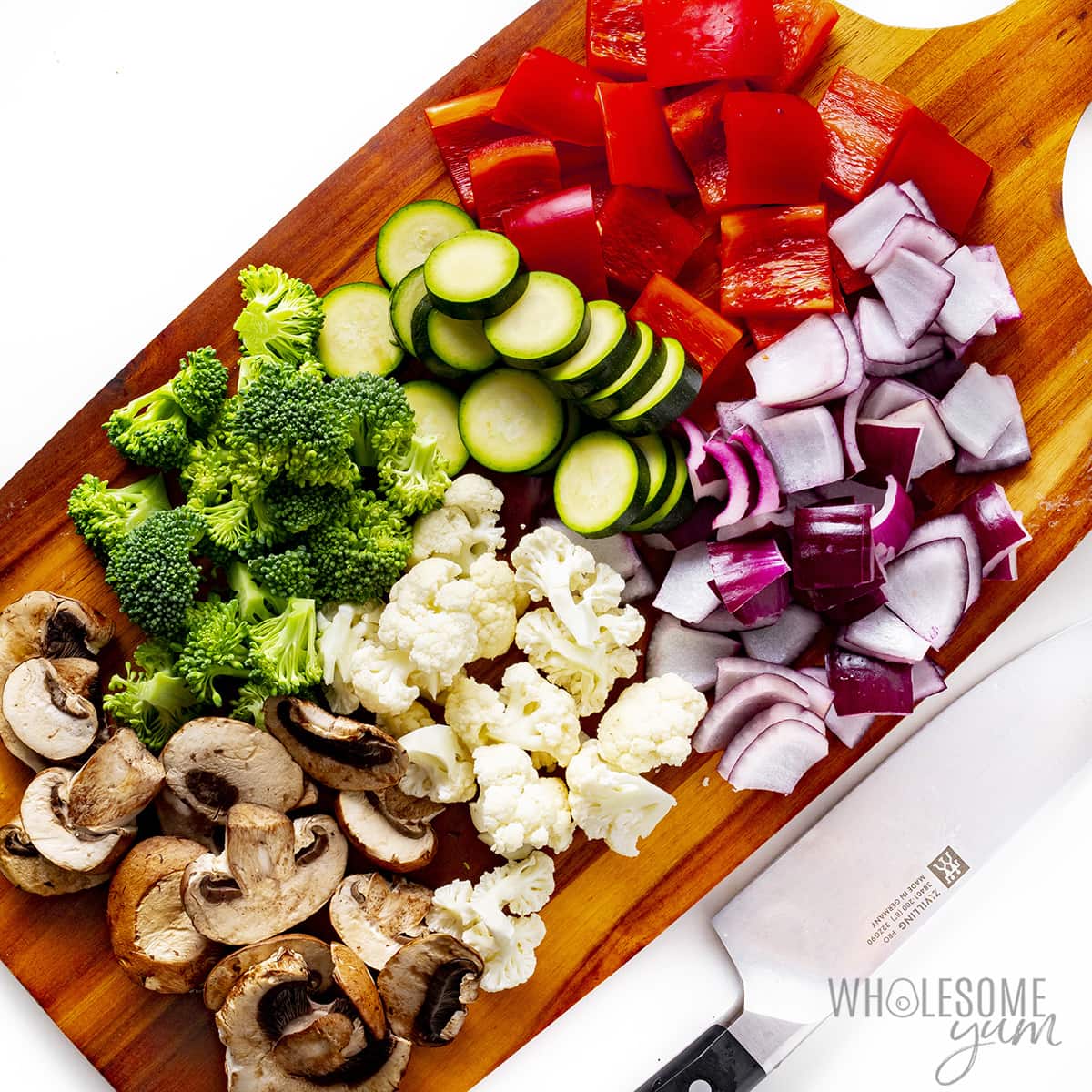 Vegetables cut on a cutting board.