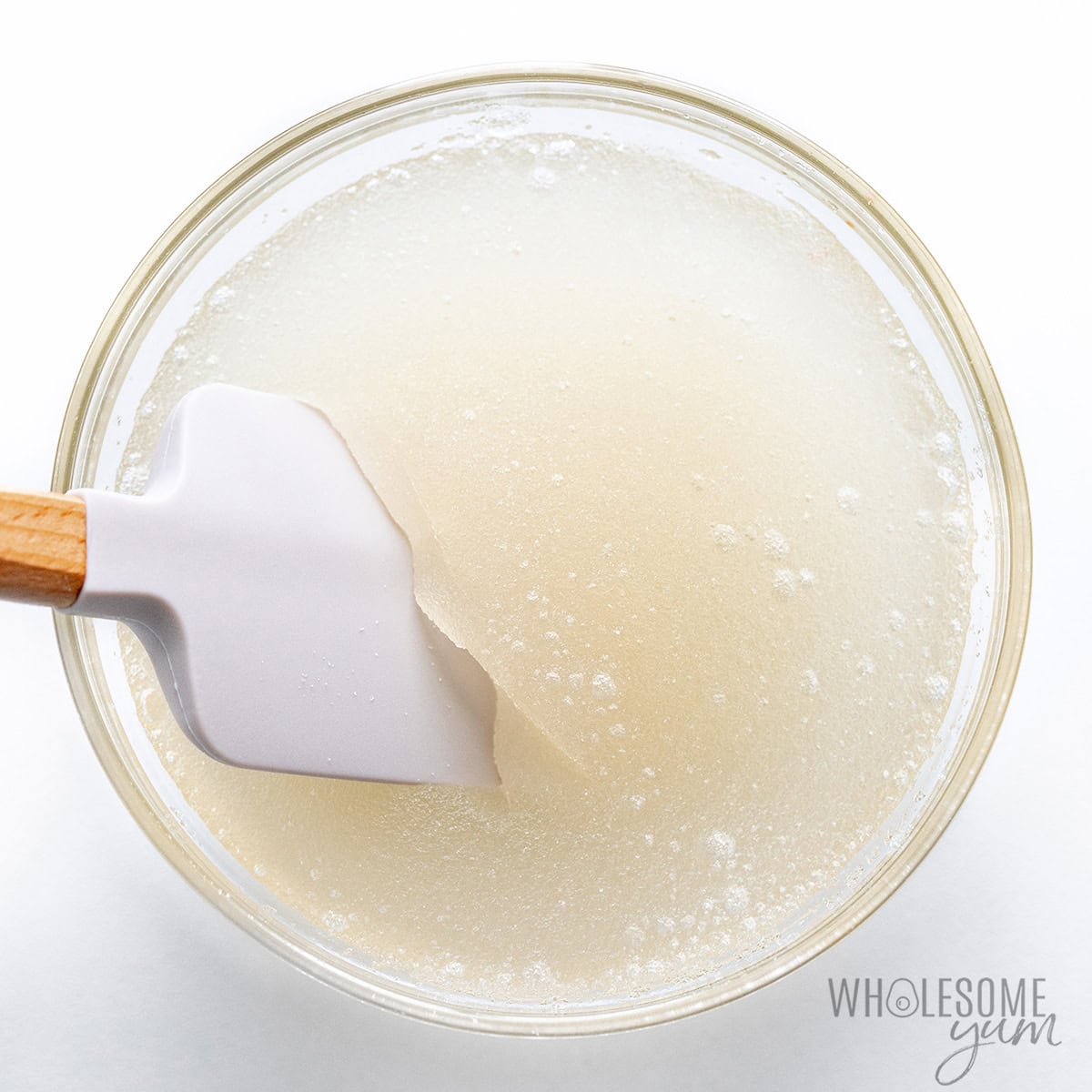 Blooming gelatin in a bowl.