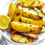 Greek lemon potatoes on a plate.