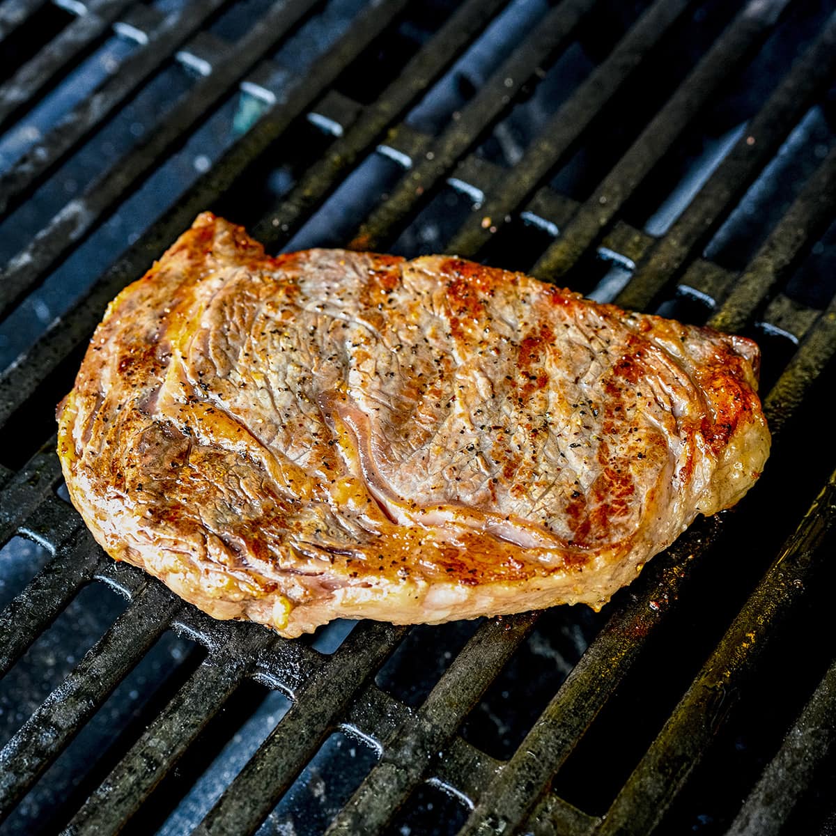 Steak grilled to perfection on a grill.