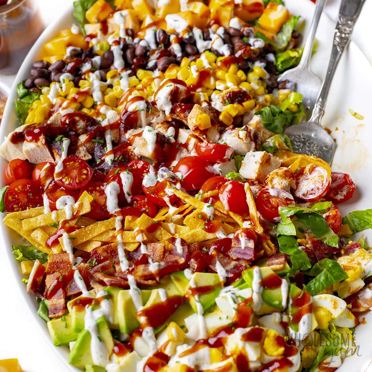 BBQ Chicken Salad Drizzled with Dressing.