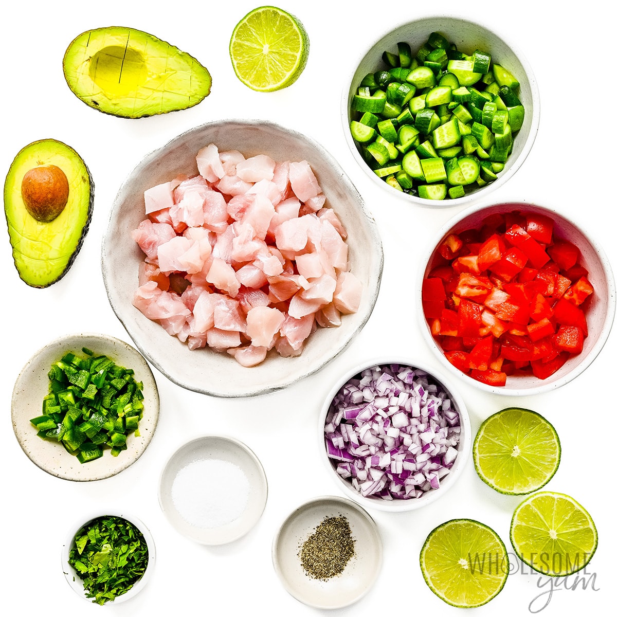 Ceviche ingredients in bowls.