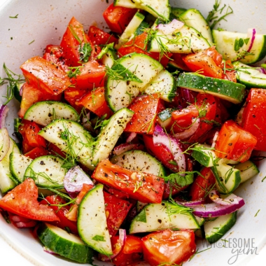 Cucumber tomato salad in a bowl.