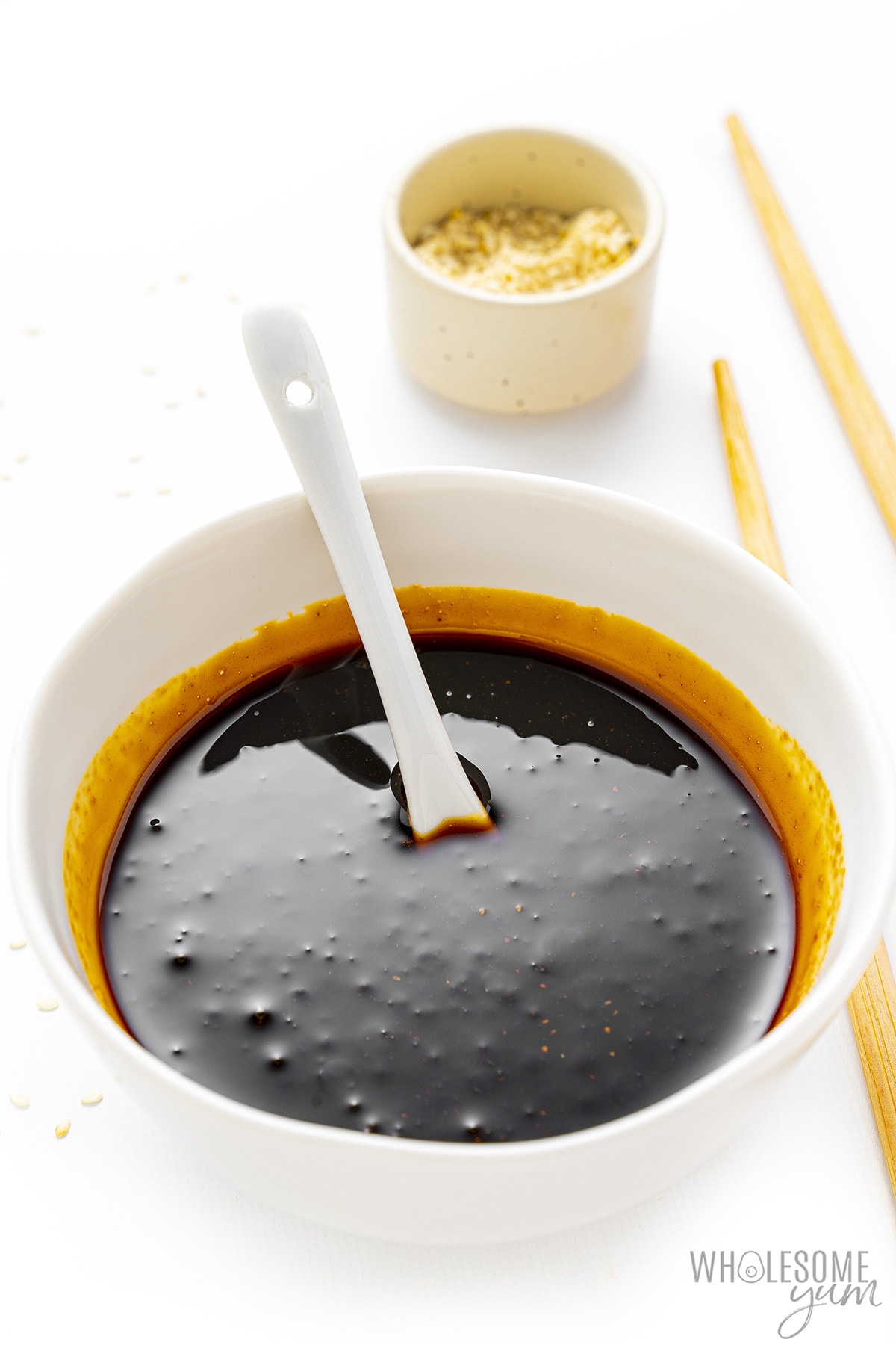 Teriyaki sauce recipe in a bowl with a spoon.