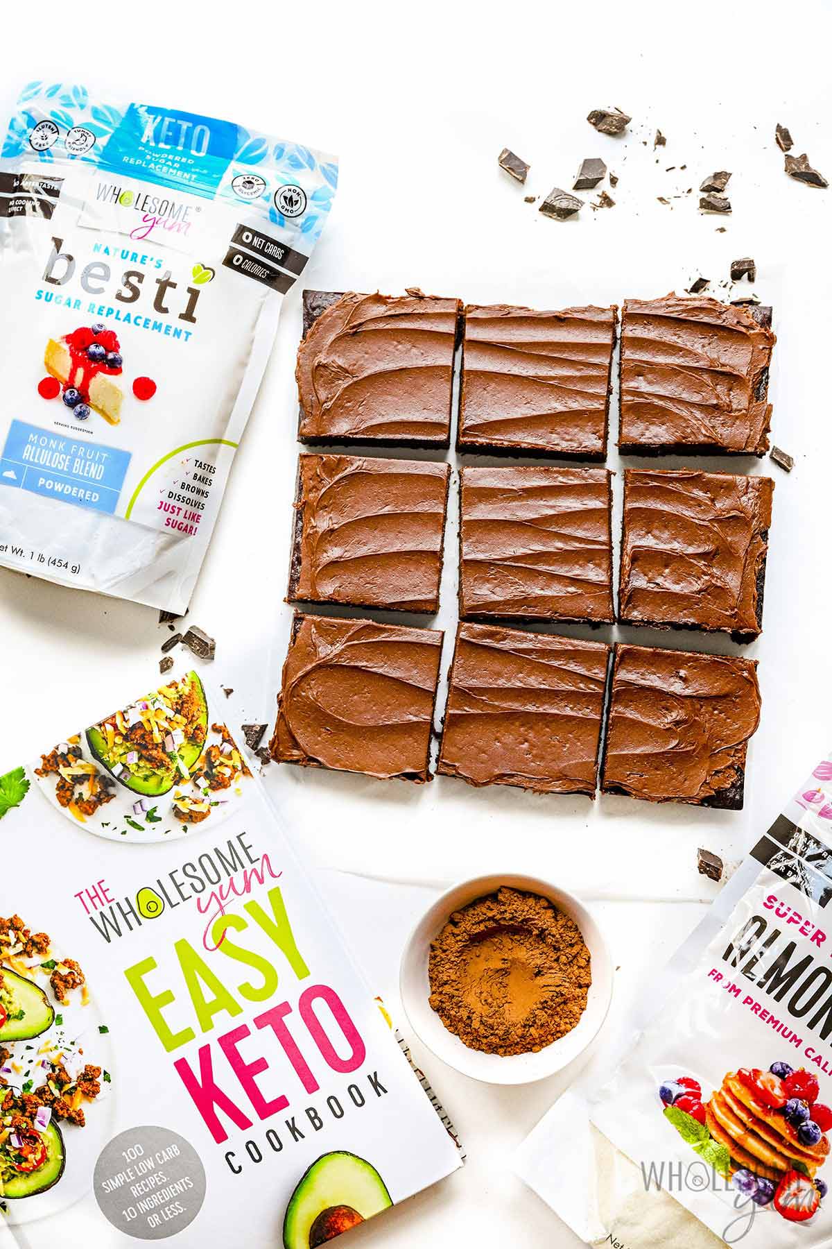 Keto brownies with bags of Besti almond flour, powdered Besti, and Easy Keto Cookbook.