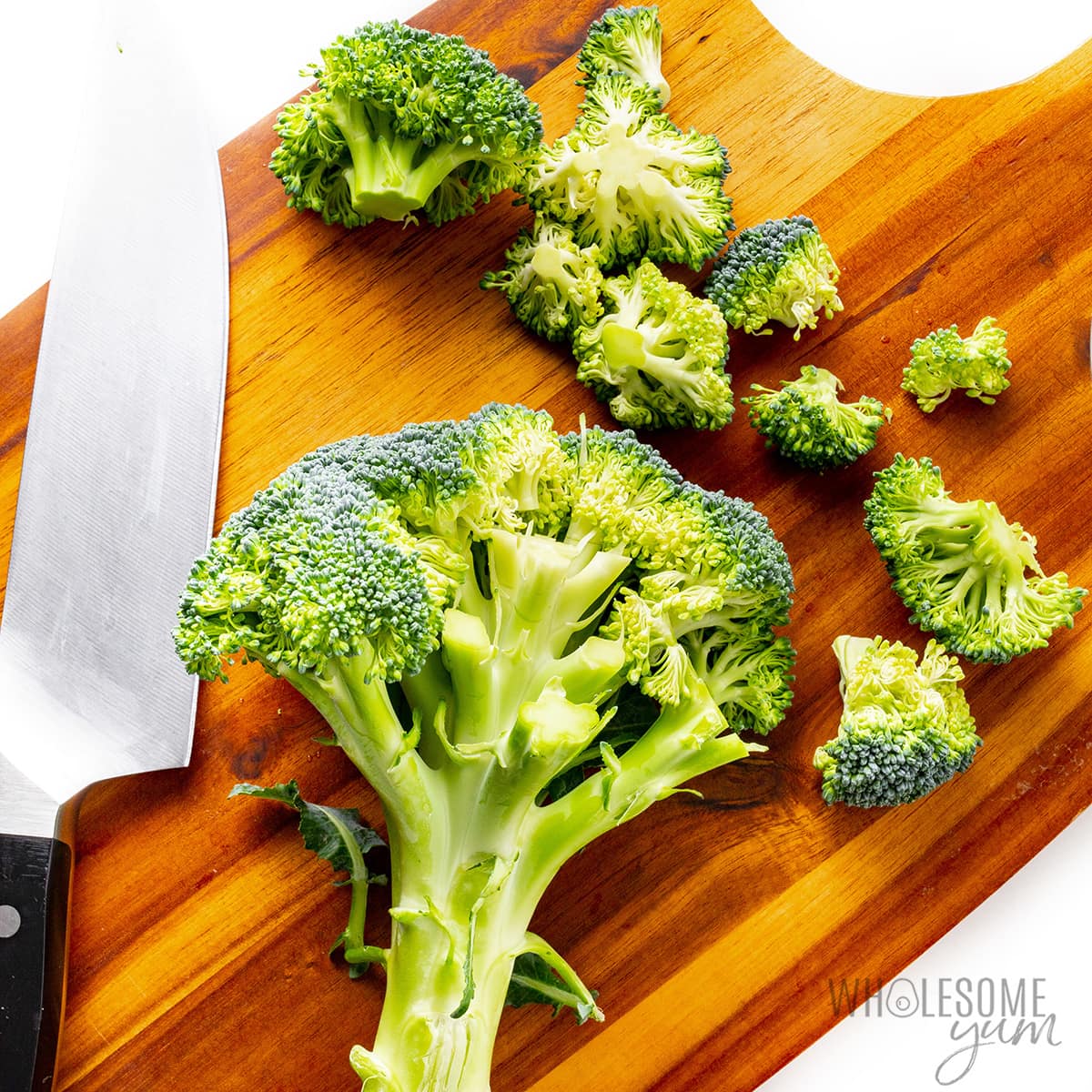 Cutting broccoli florets off the stem.