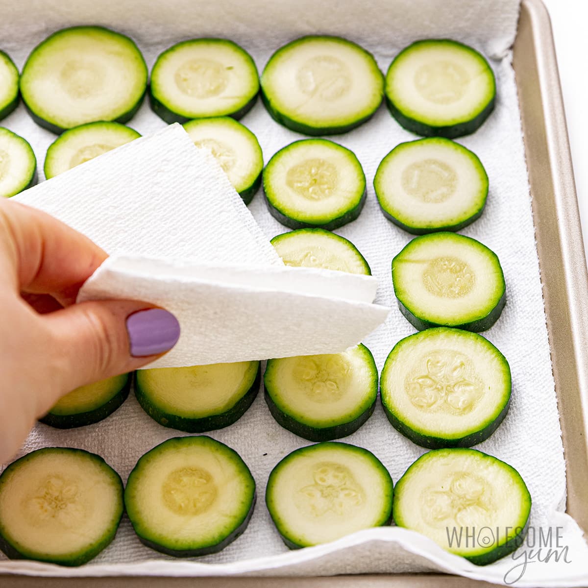 Zucchini slices patted dry with paper towel.