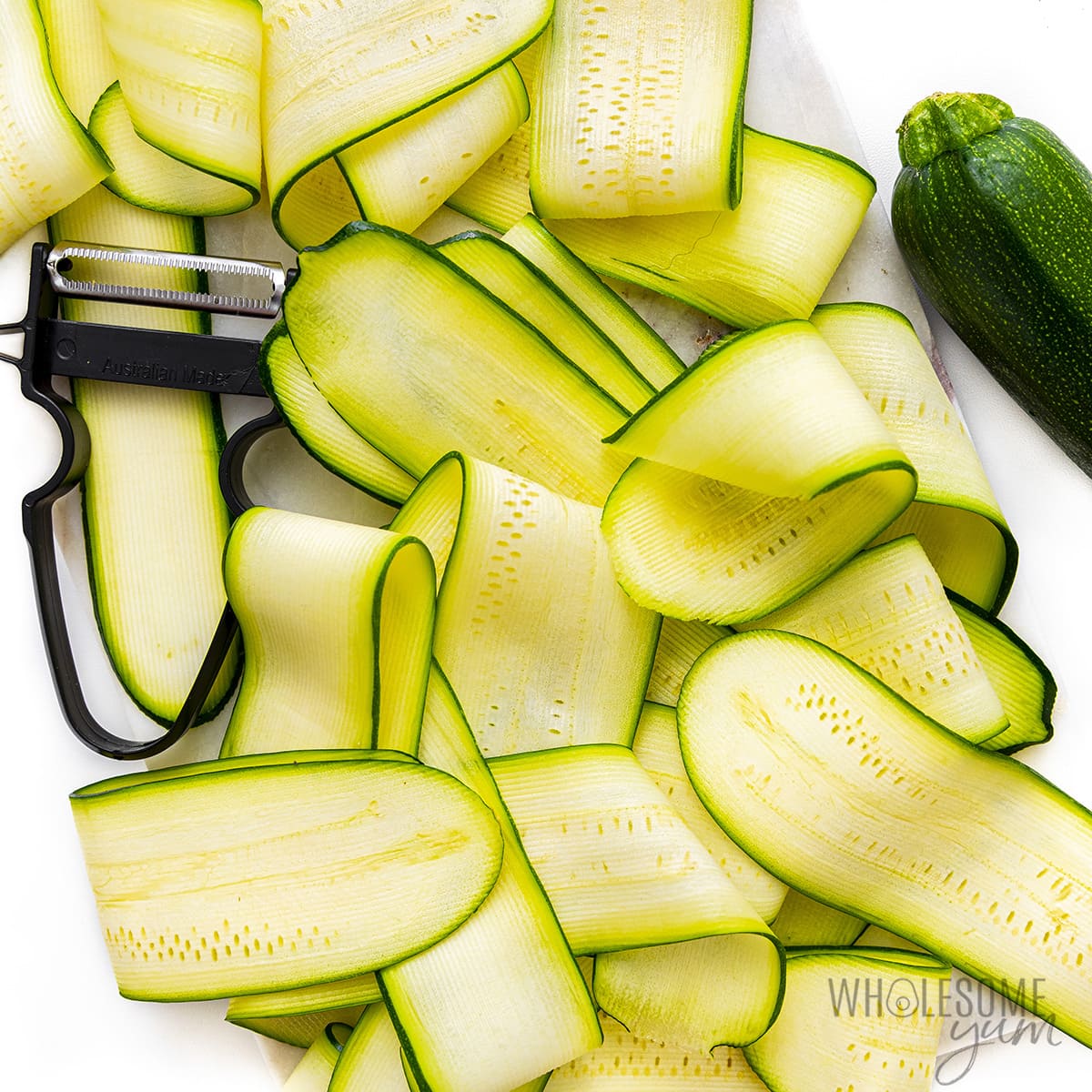 Zucchini sliced into ribbons.