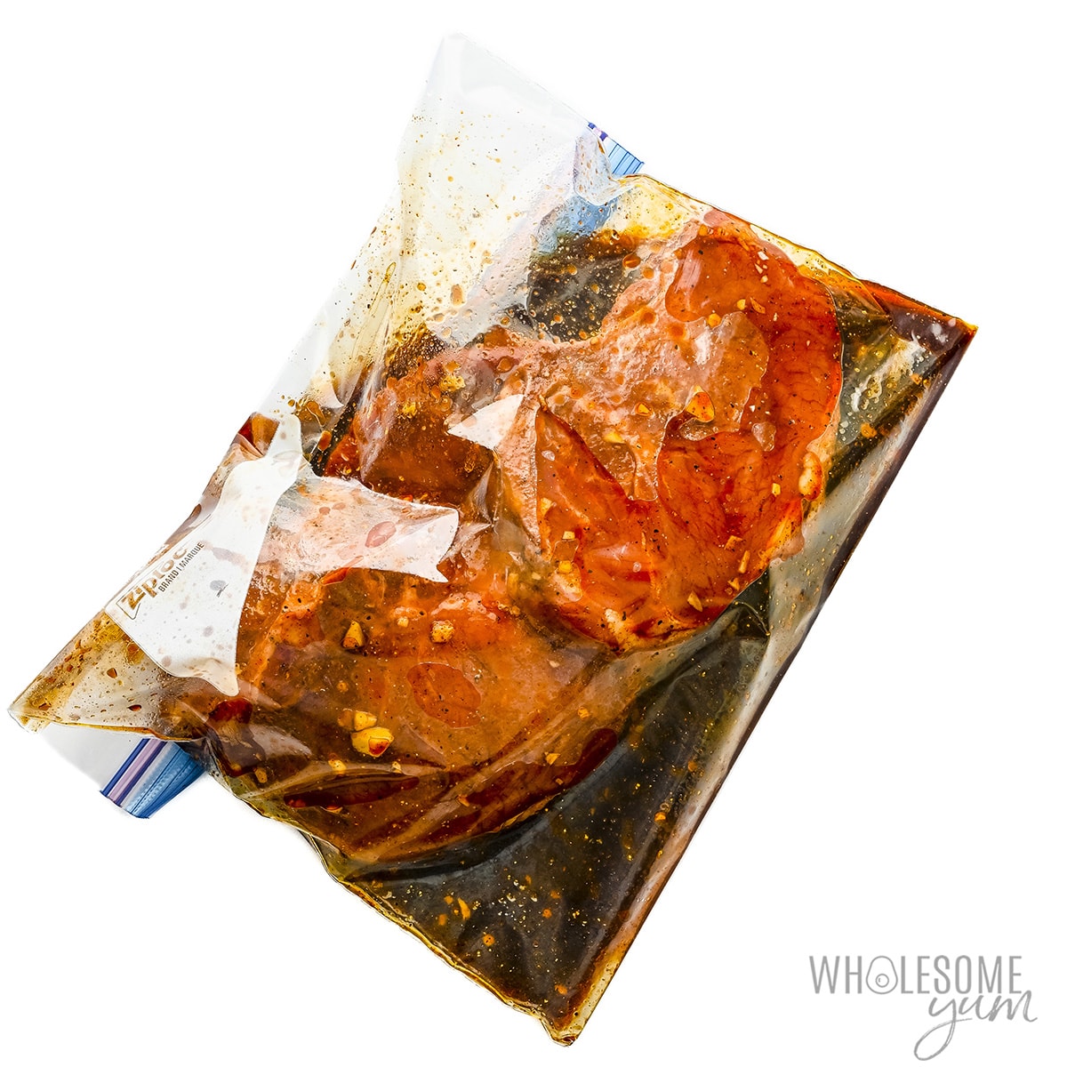 Meat marinating in a zip lock bag.