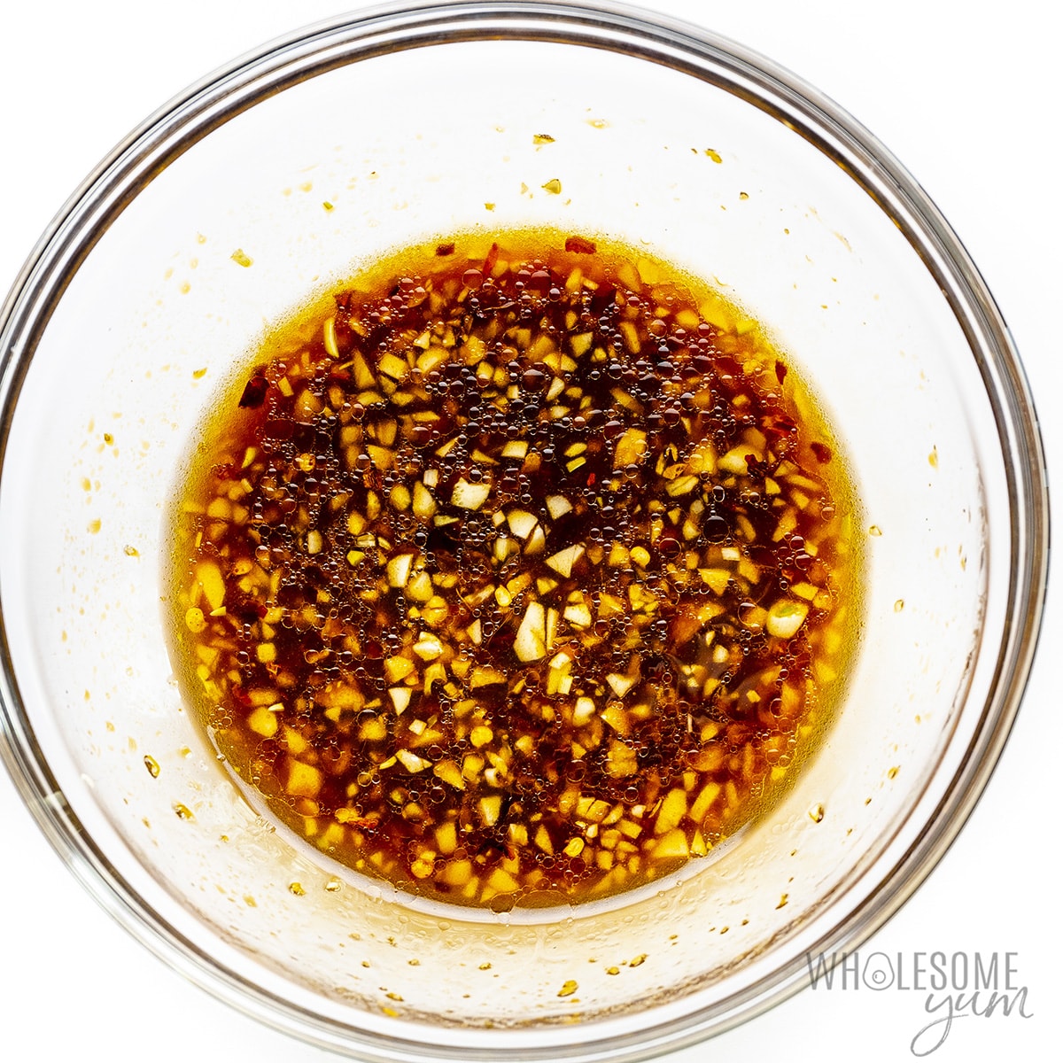 Marinade ingredients whisked together in a bowl.