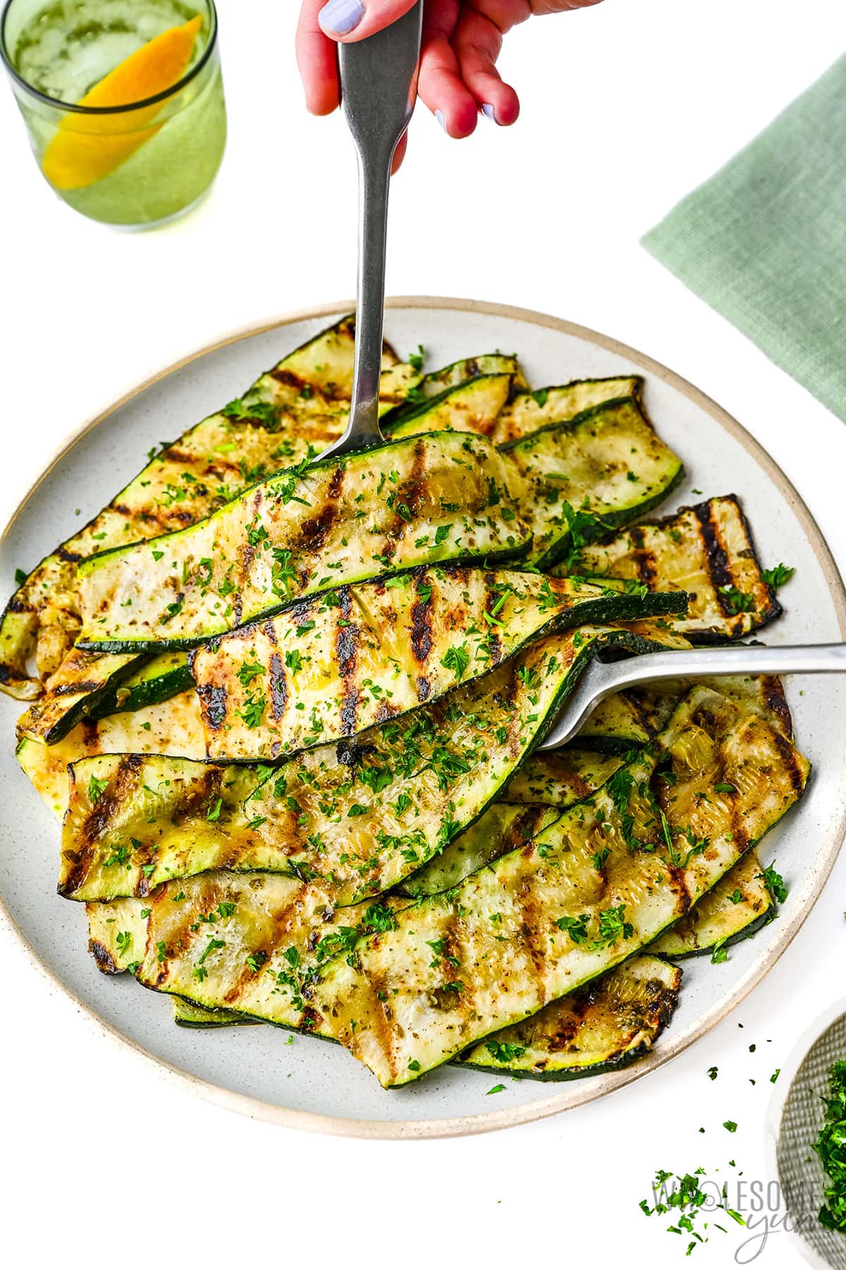 Grilled zucchini recipe being served.