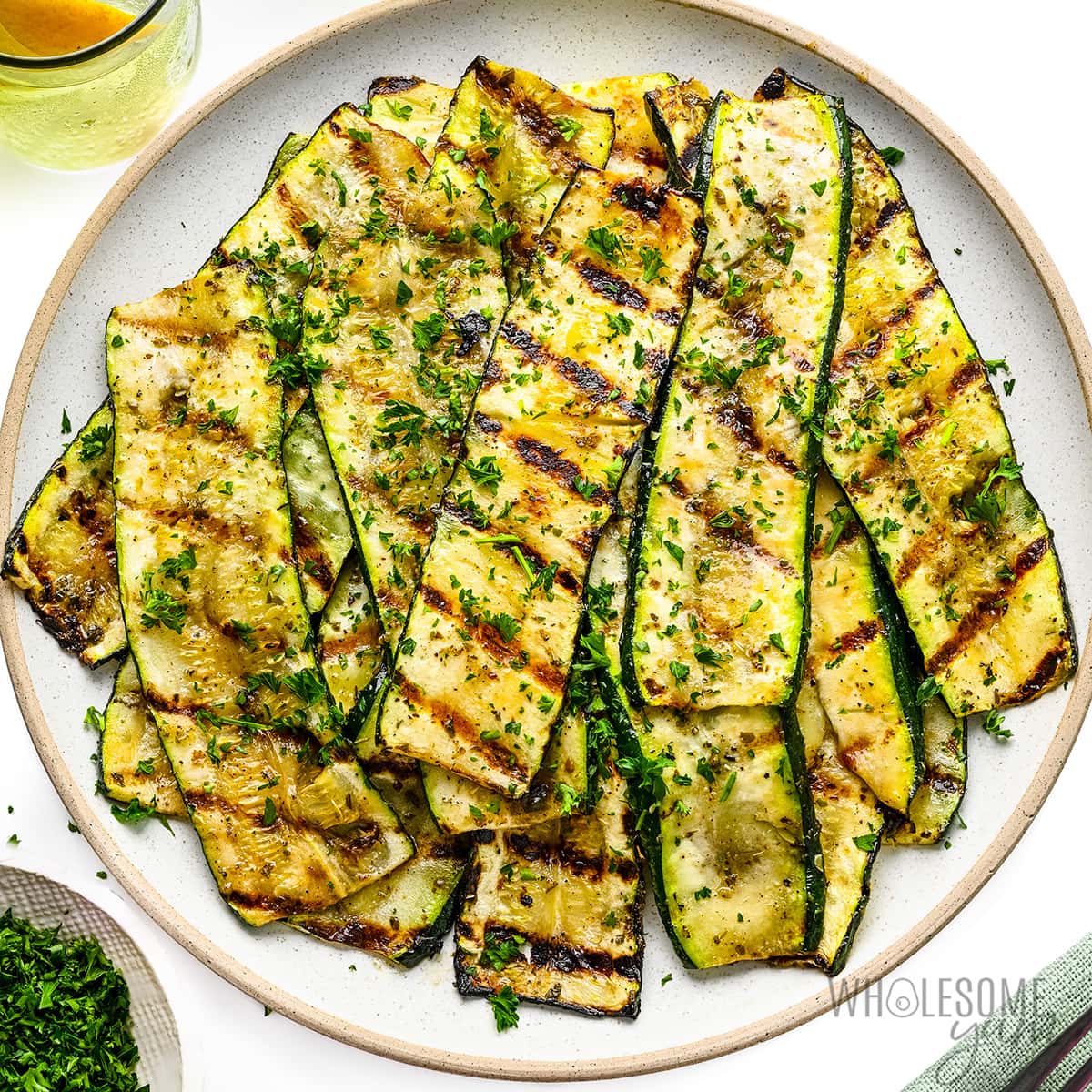 Grilled zucchini on a plate.