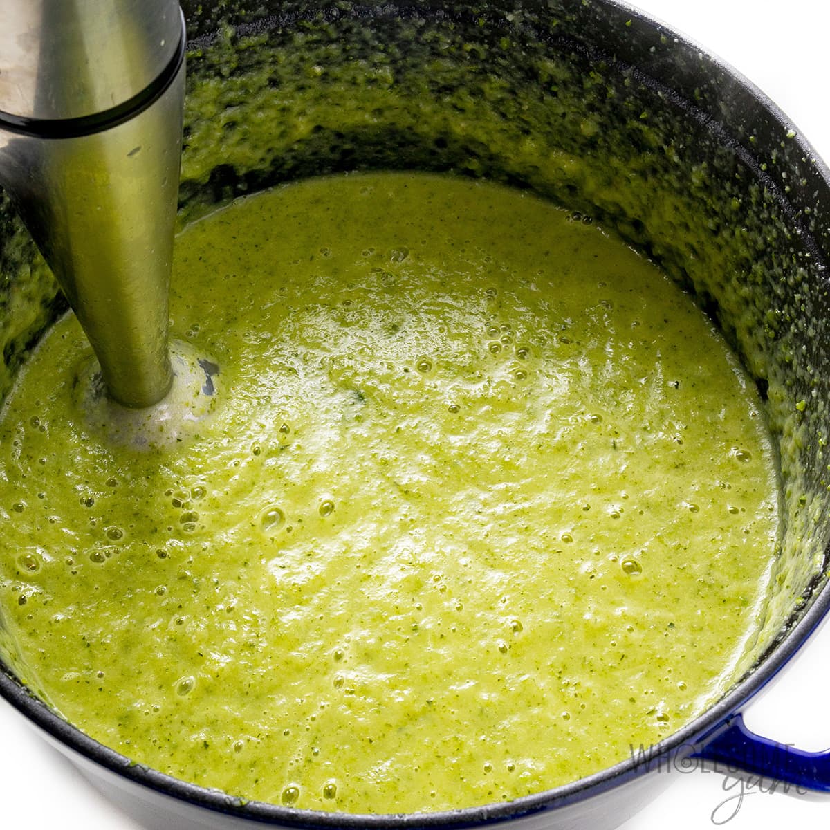 Zucchini soup blended until smooth.