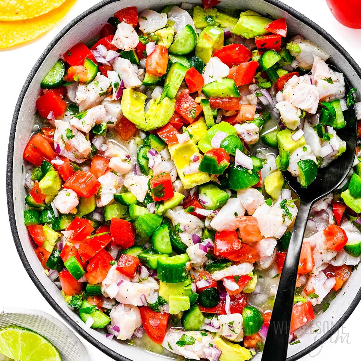 Ceviche recipe in a bowl with a spoon.