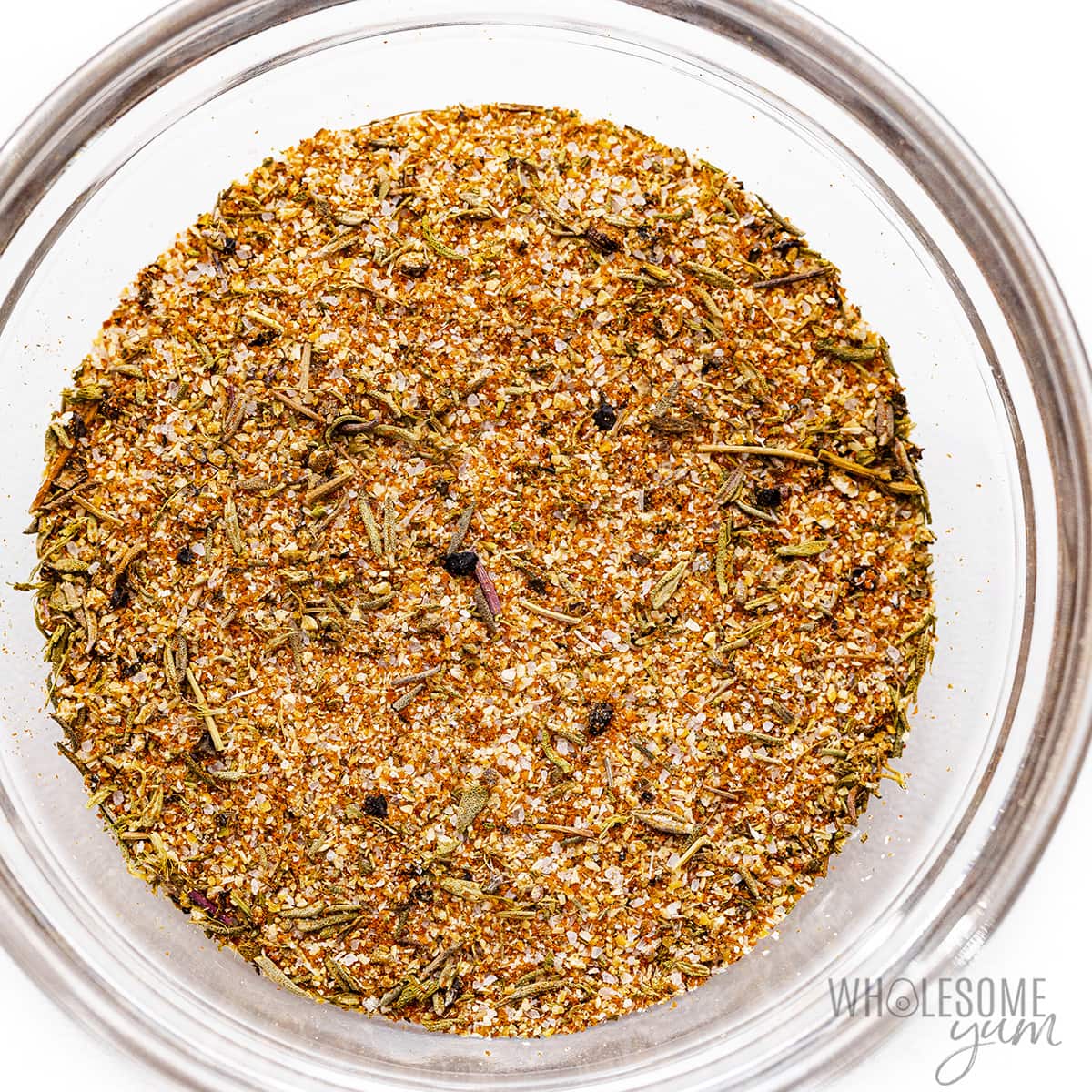 Spices are mixed together in a bowl.