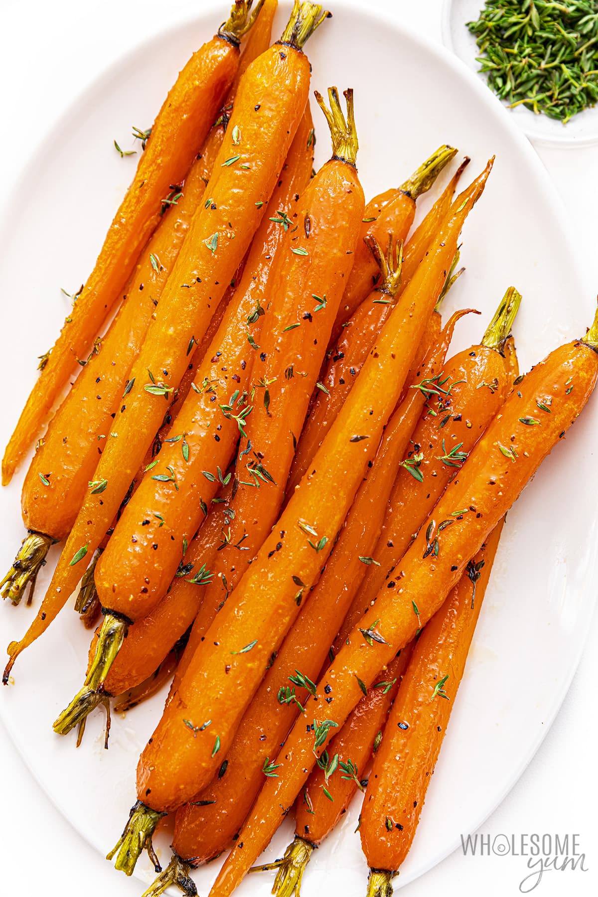 Oven roasted carrots on a serving platter.