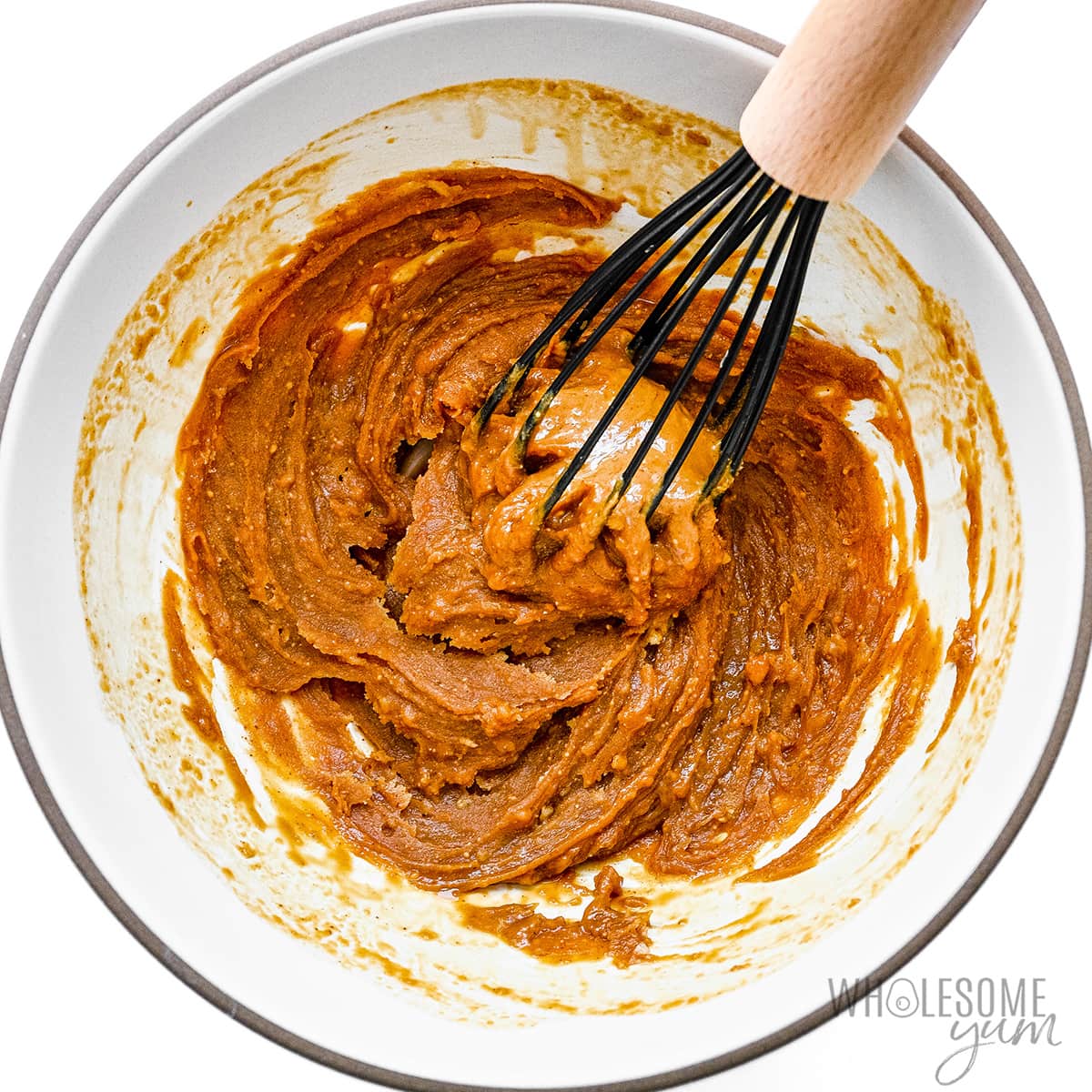 Nut butter, garlic, coconut aminos, honey, and rice vinegar whisked together.