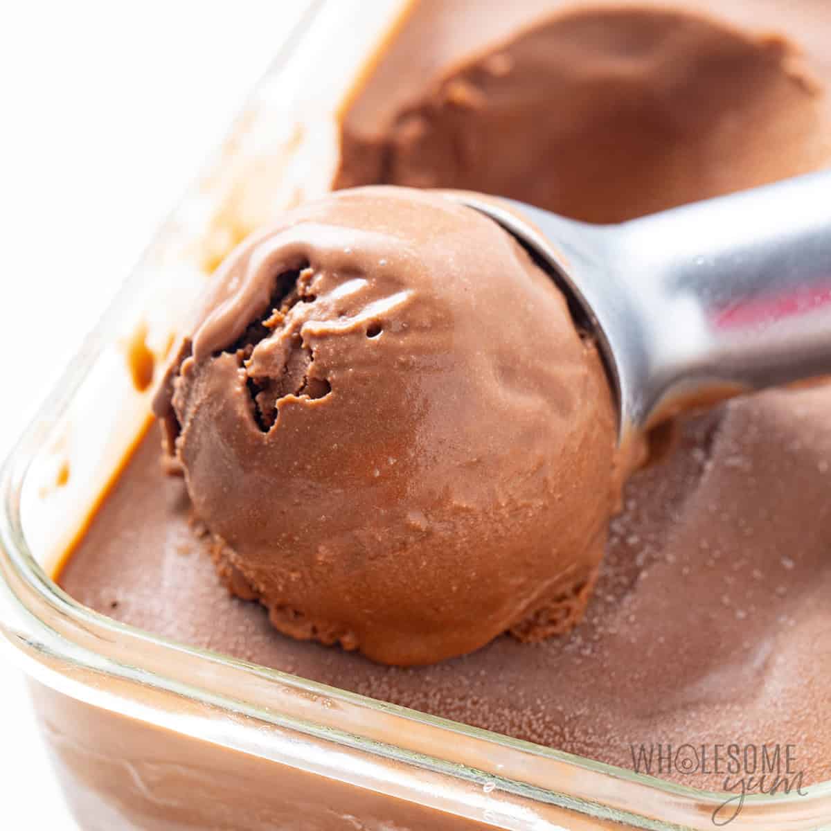 Frozen protein ice cream recipe scooped up close to show the creamy texture.