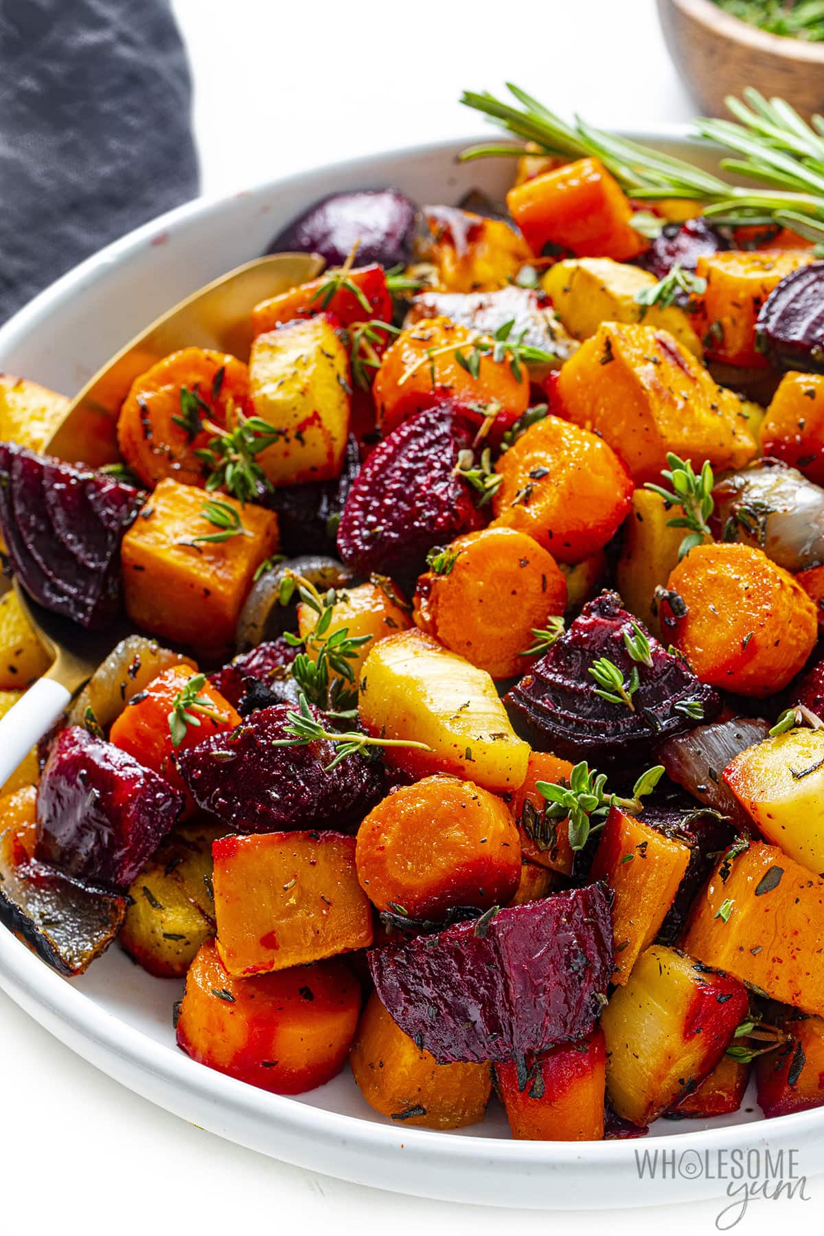 Roasted root vegetables recipe in a bowl.