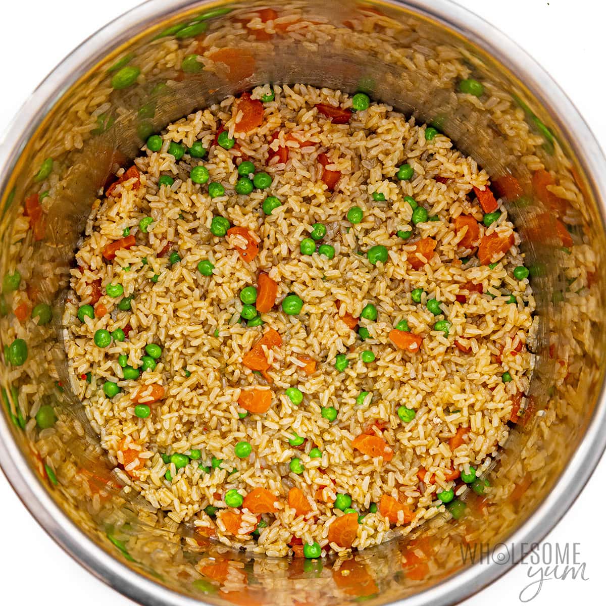 Rice and vegetables mixed together.
