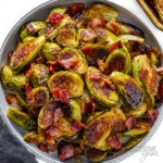 Place Brussels sprouts and bacon in a bowl.