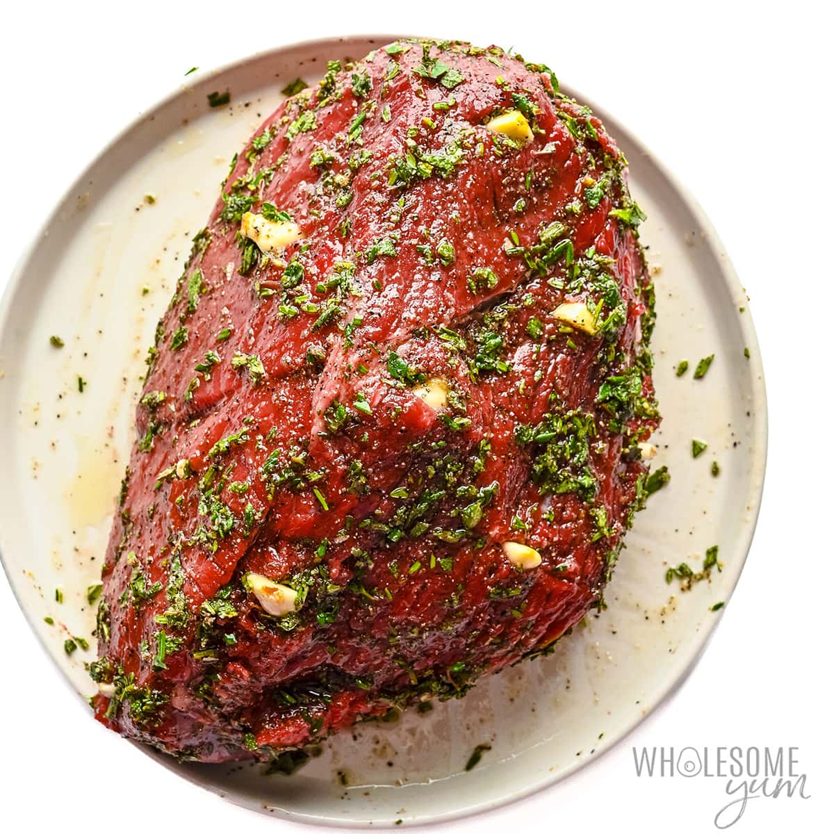 Rub the herb and oil mixture all over the rump roast.
