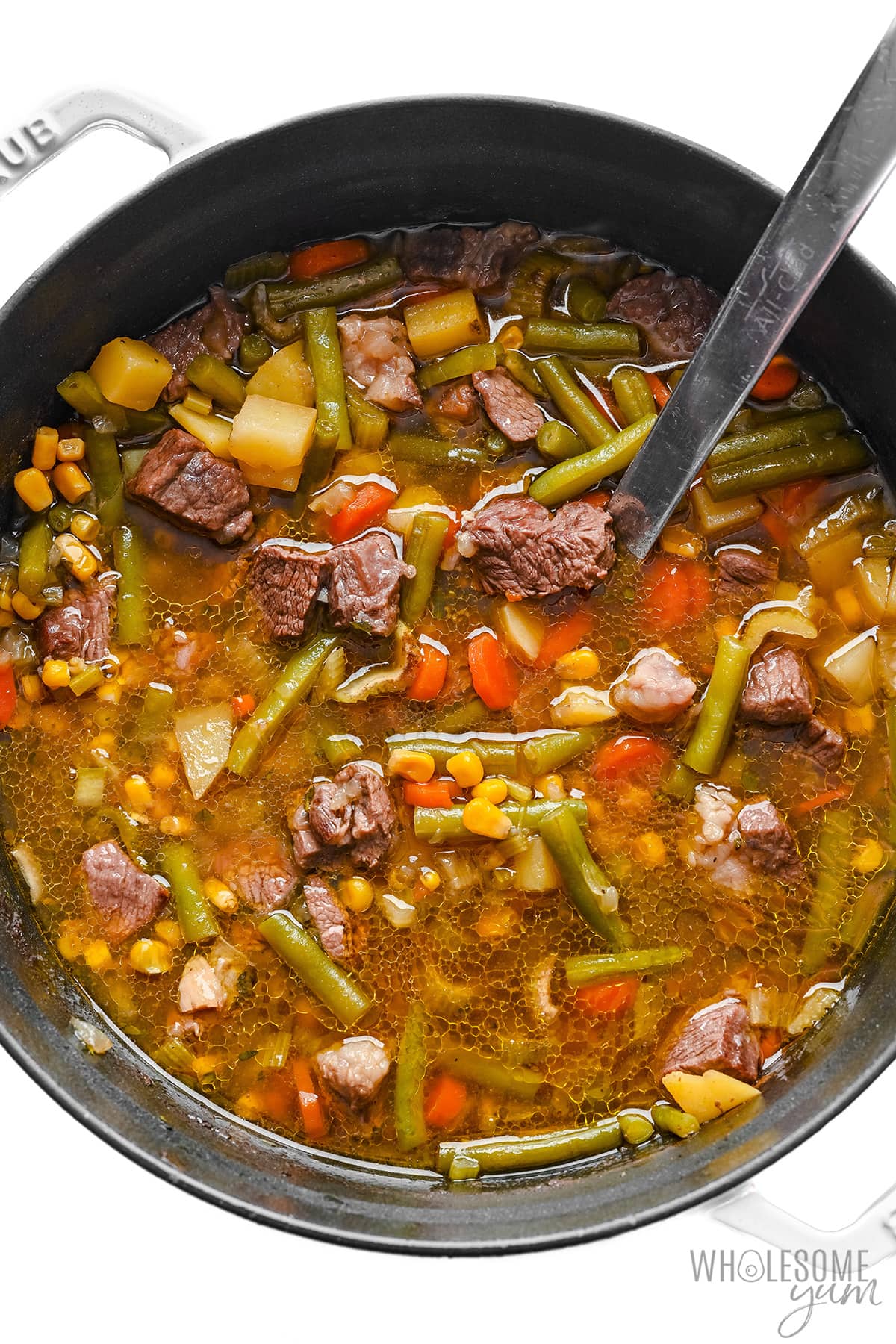 Vegetable beef soup in a pot.
