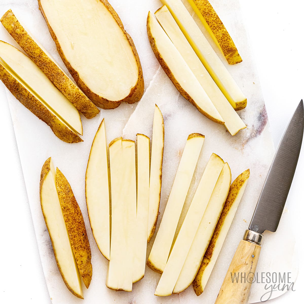 Potatoes sliced into thin strips.