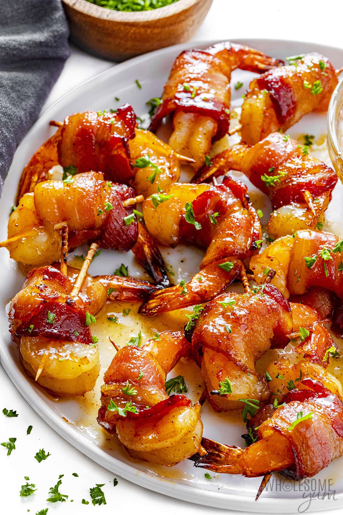 Bacon wrapped shrimp recipe on a plate.