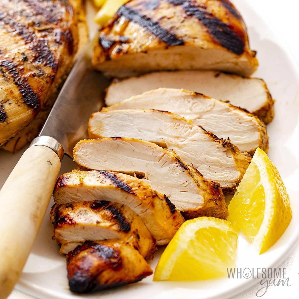 Grilled chicken breast close up.