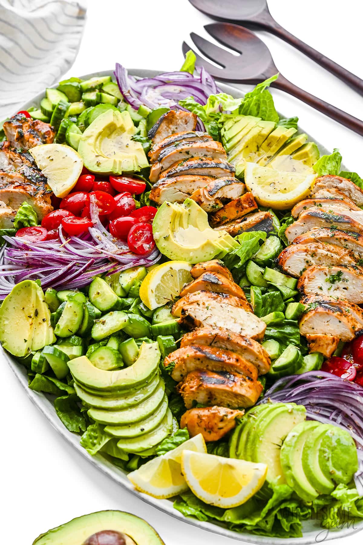 Grilled chicken salad recipe on a platter.