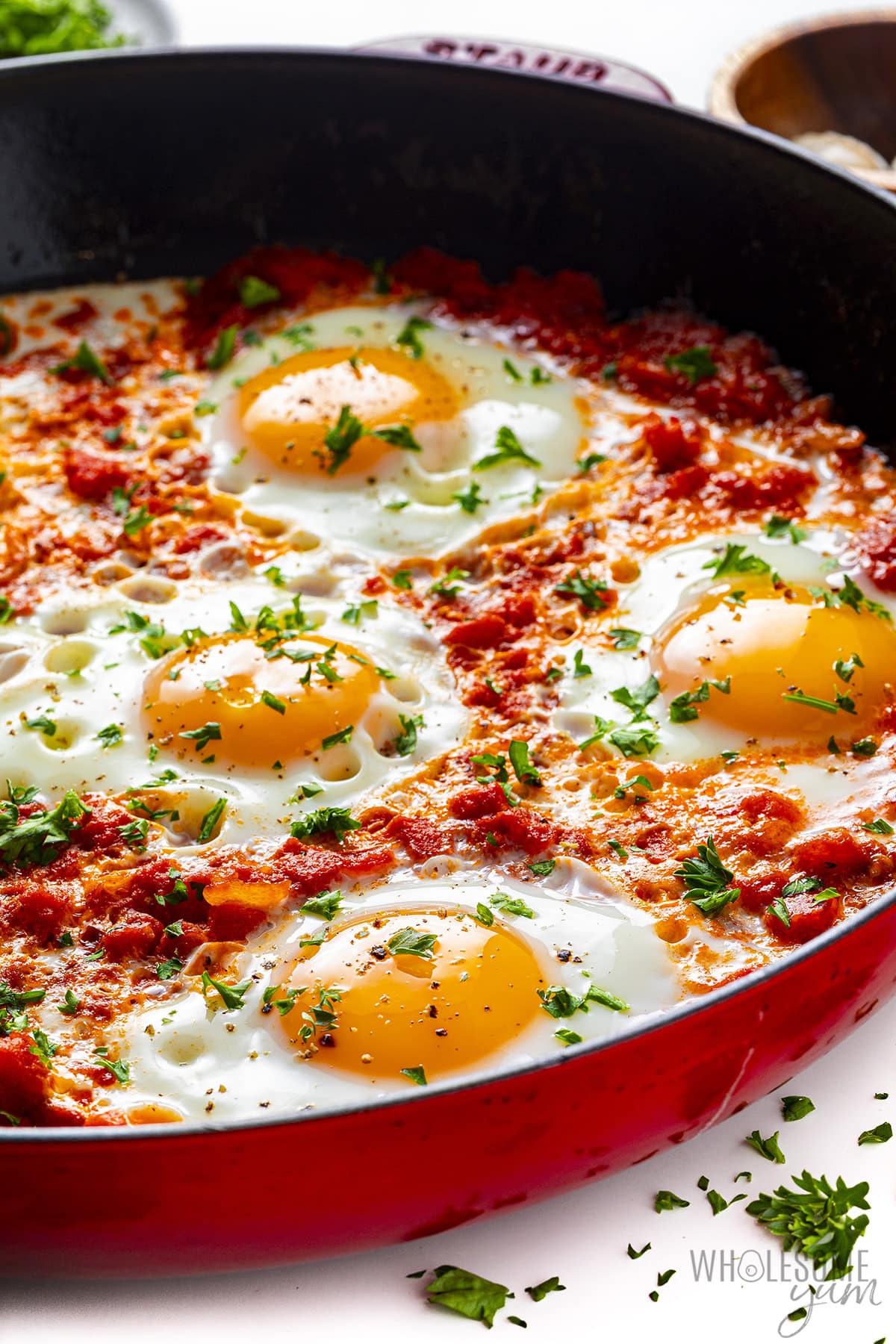 Spiced egg dish in a skillet.