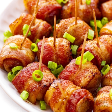 Bacon wrapped water chestnuts close up.