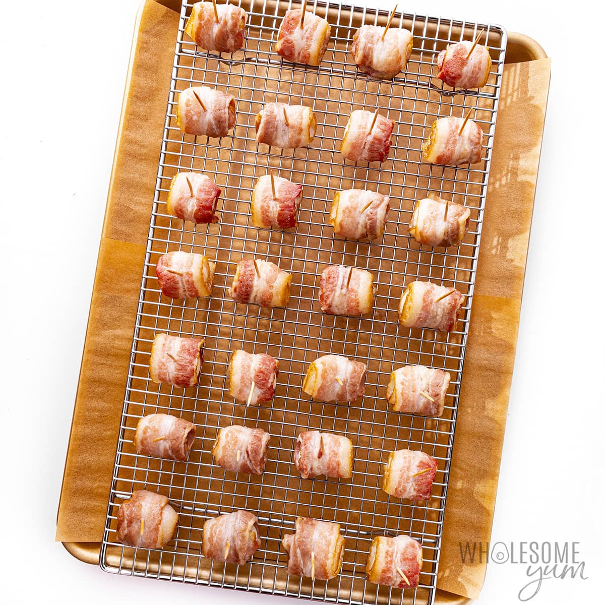 Water chestnuts wrapped in bacon and secured with a toothpick.