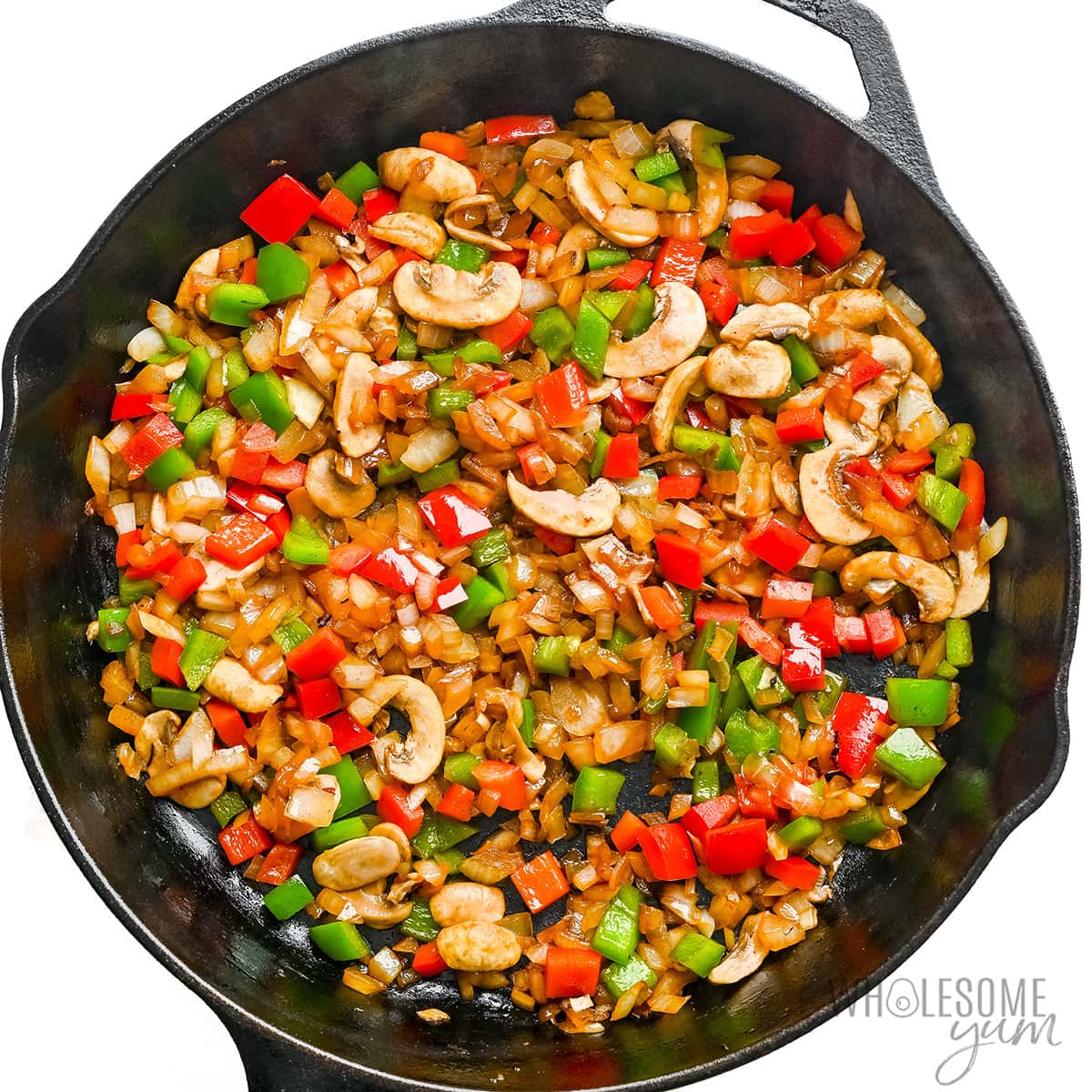 Veggies sauteed in a skillet.