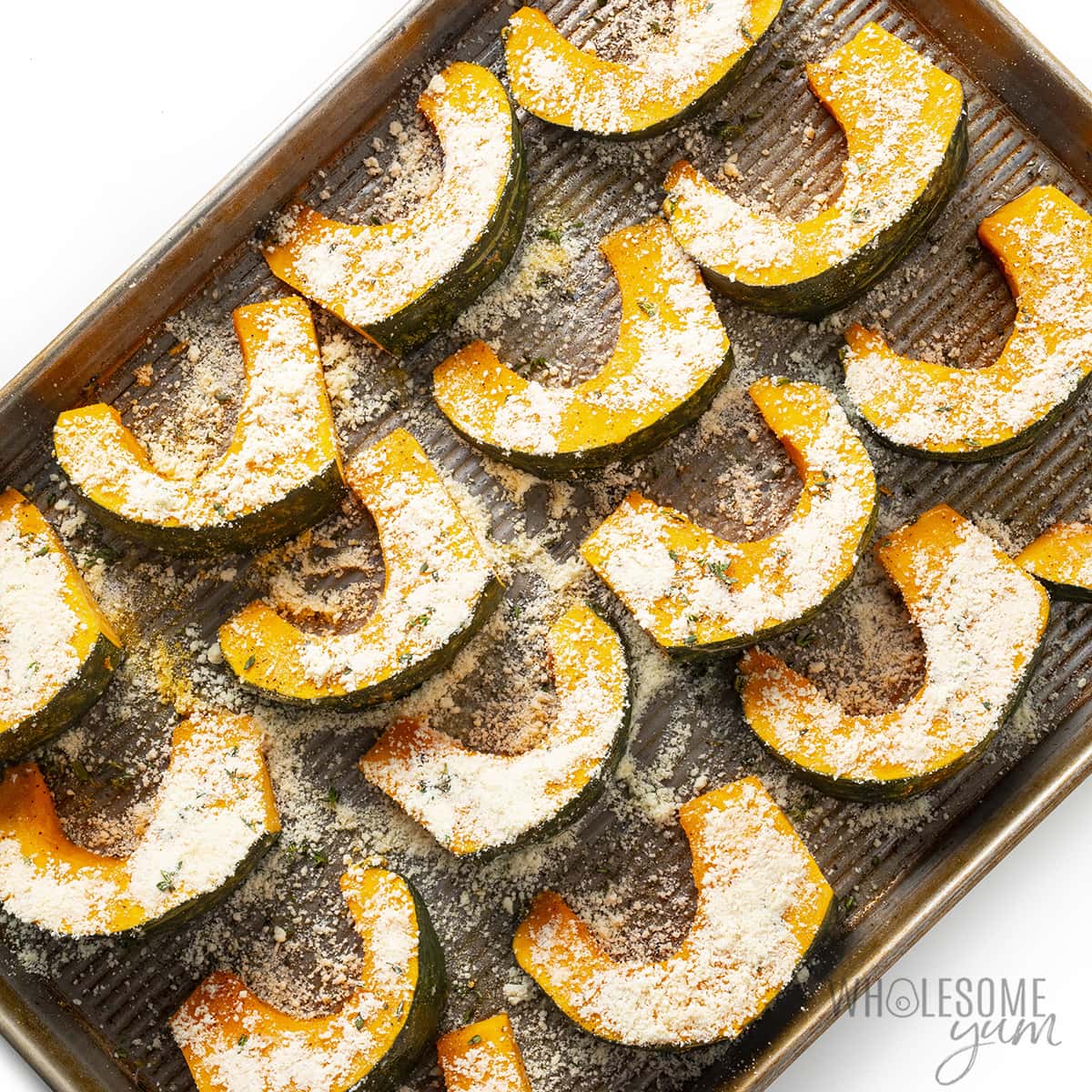 Buttercup squash sprinkled with seasonings.