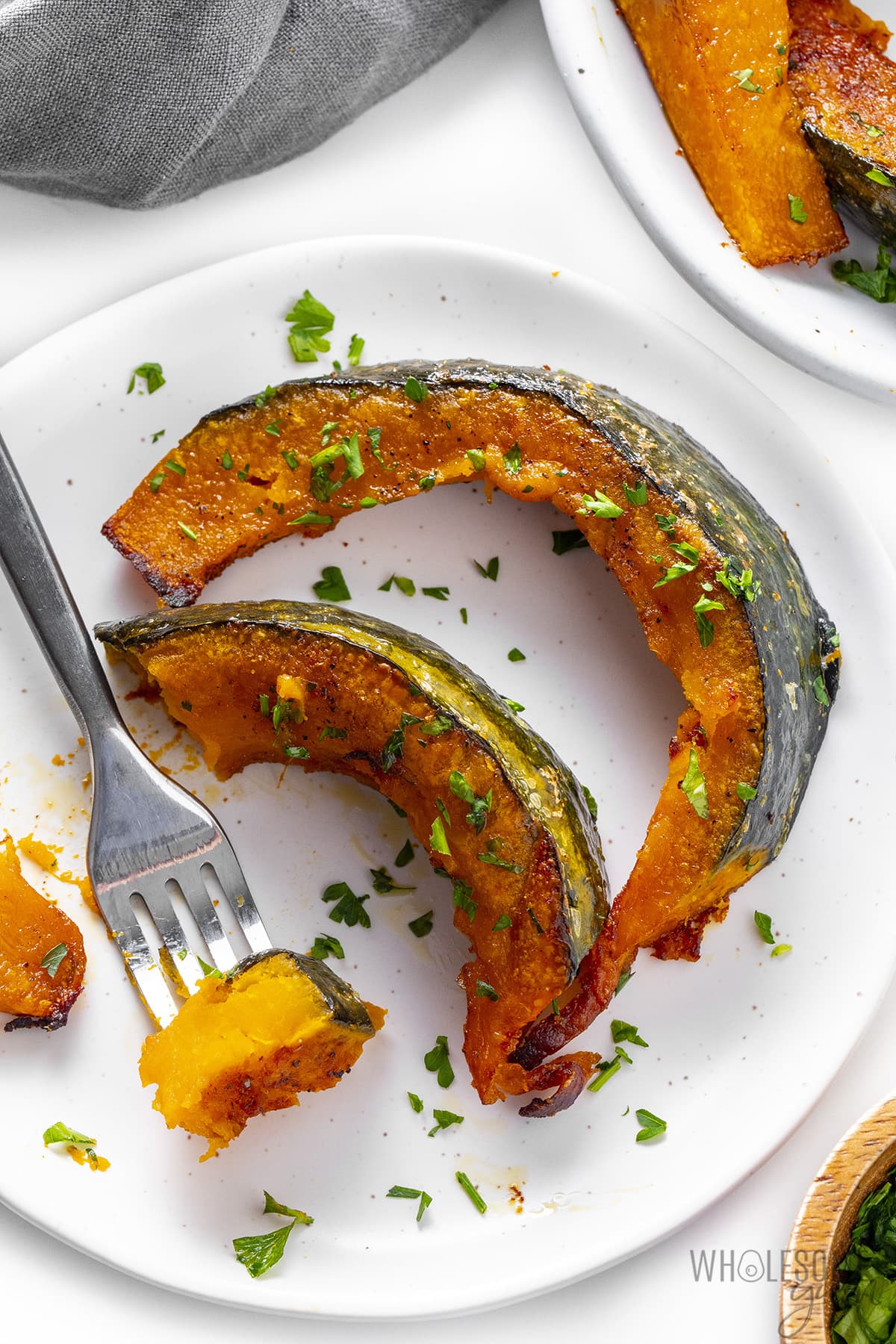 Use a fork to transfer the kabocha squash to a plate to show the texture.