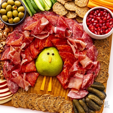 Thanksgiving charcuterie board in the shape of a turkey.