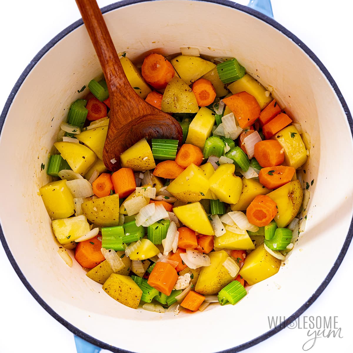 Sauteed veggies in a pot.