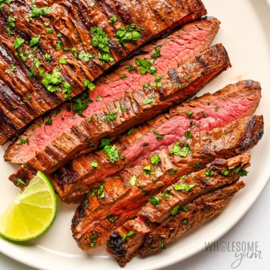 Flank steak sliced on a plate.