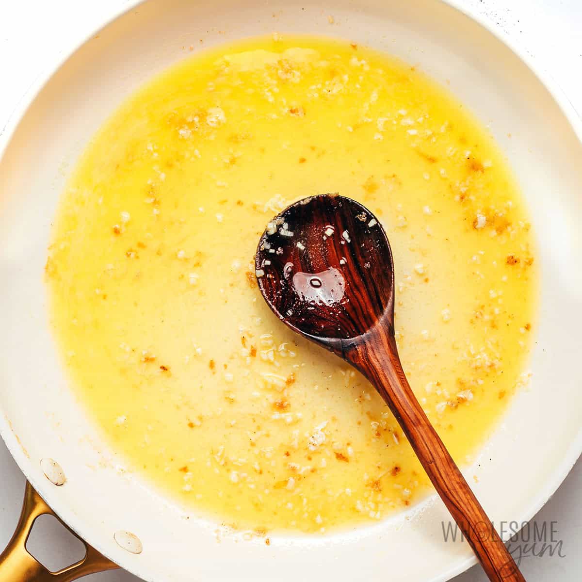 Garlic sauteed in butter in the skillet.