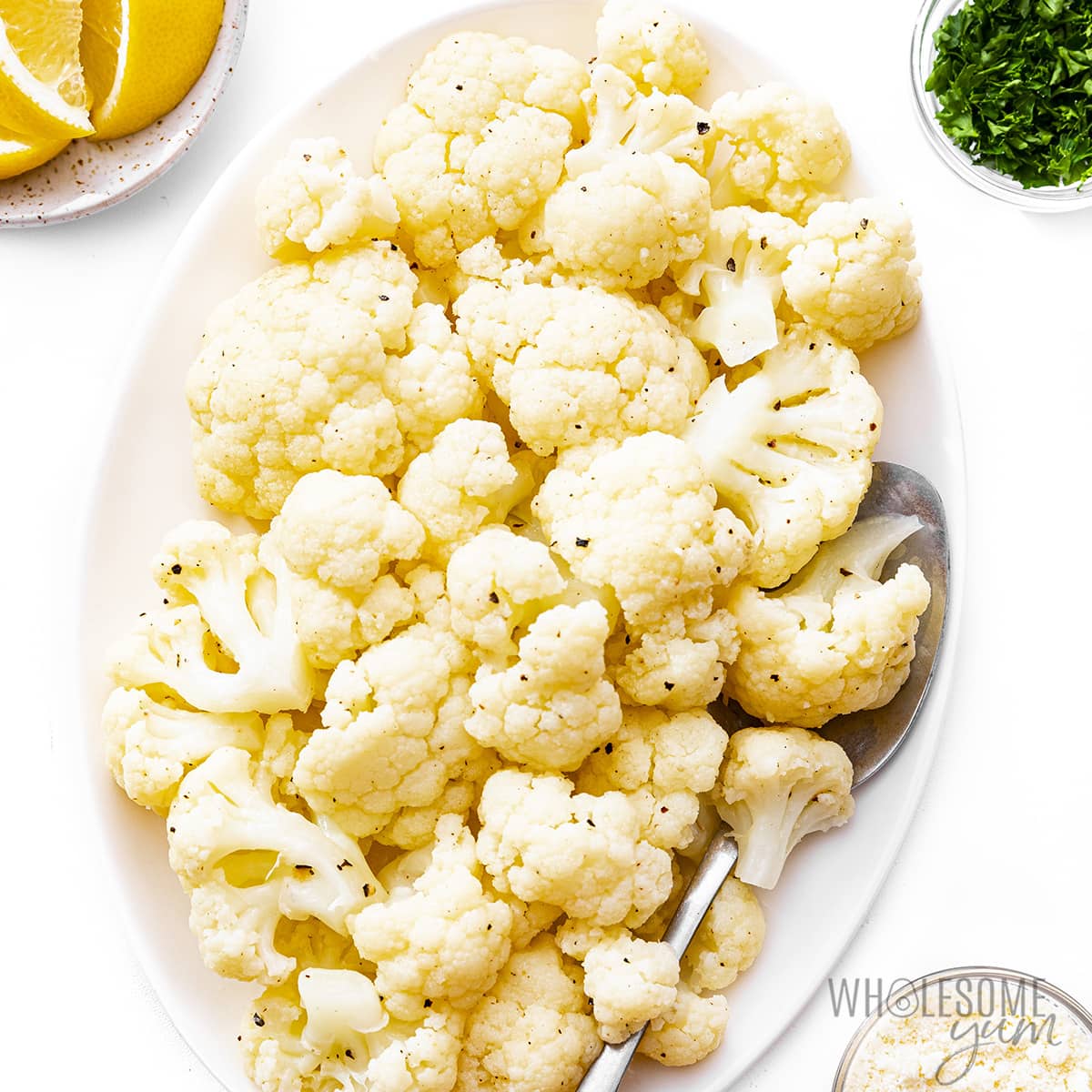 Cooked cauliflower in a serving dish.