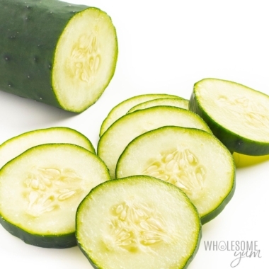 Sliced cucumber on white background.