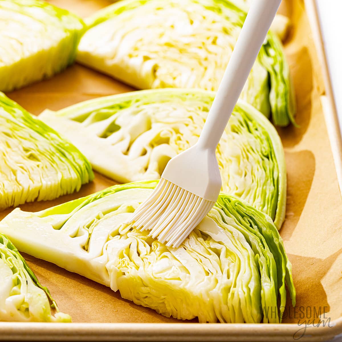 Cabbage wedges brushed with olive oil mixture.