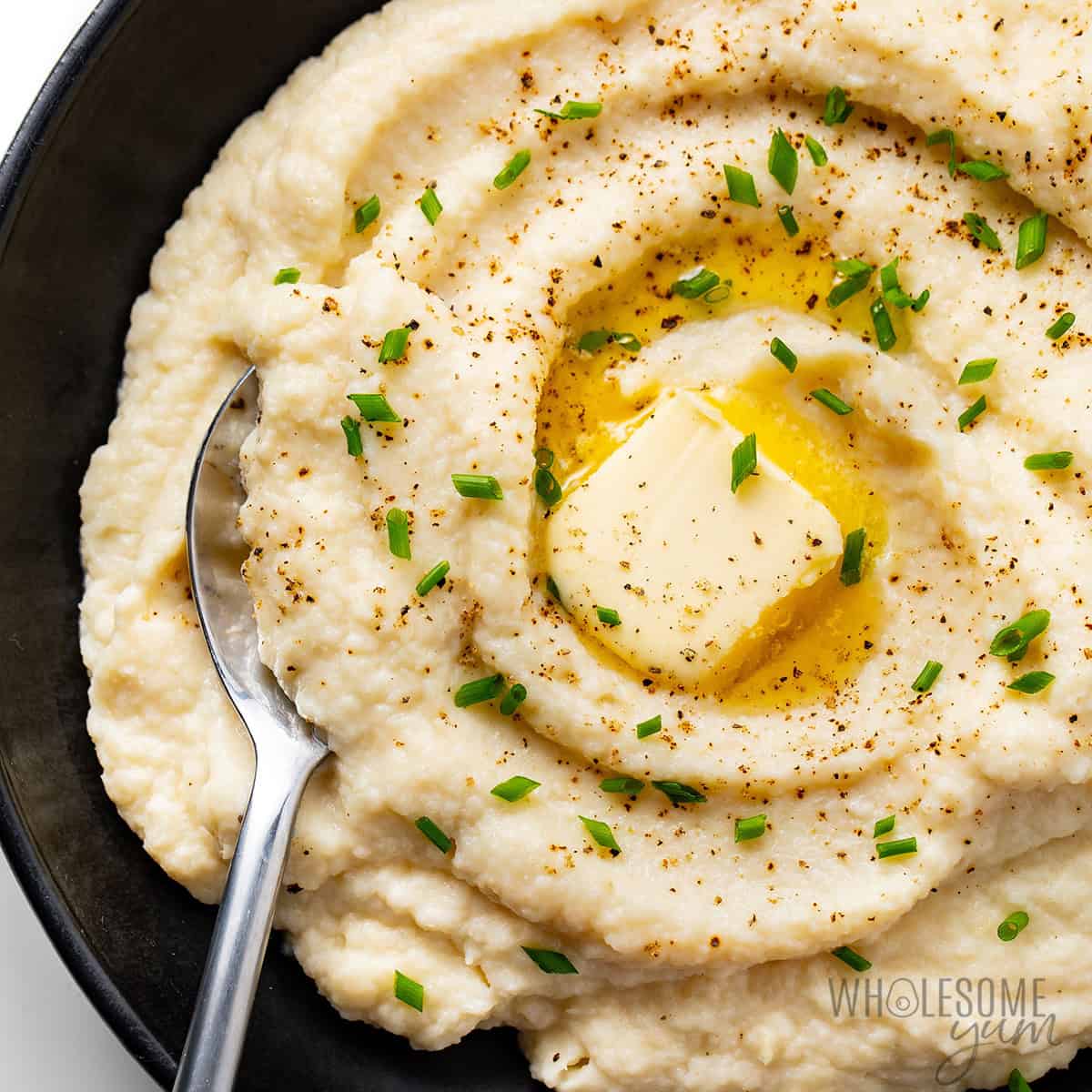 Mashed cauliflower in a bowl.
