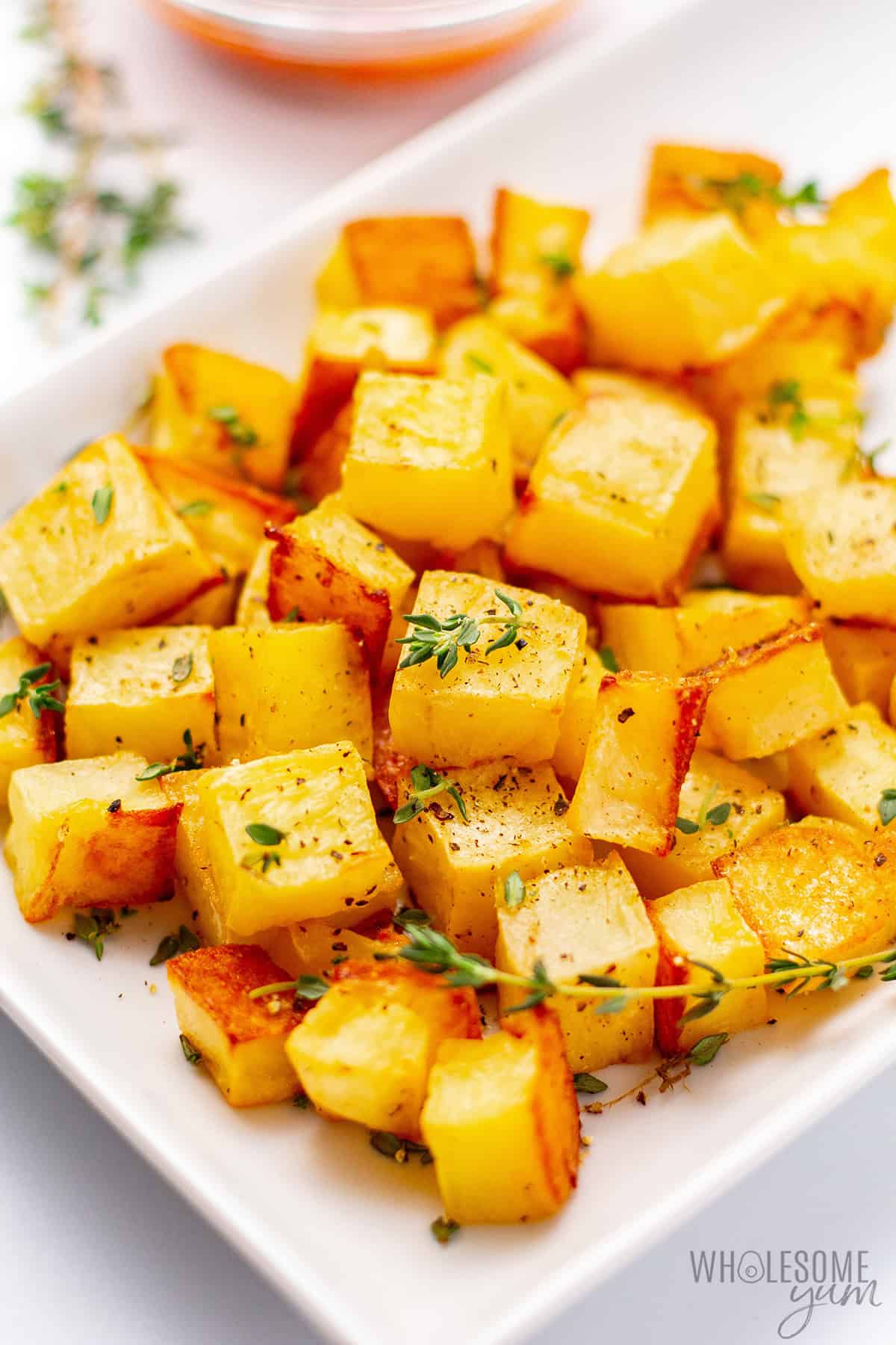 Tender, crispy rutabaga cubes on a platter.