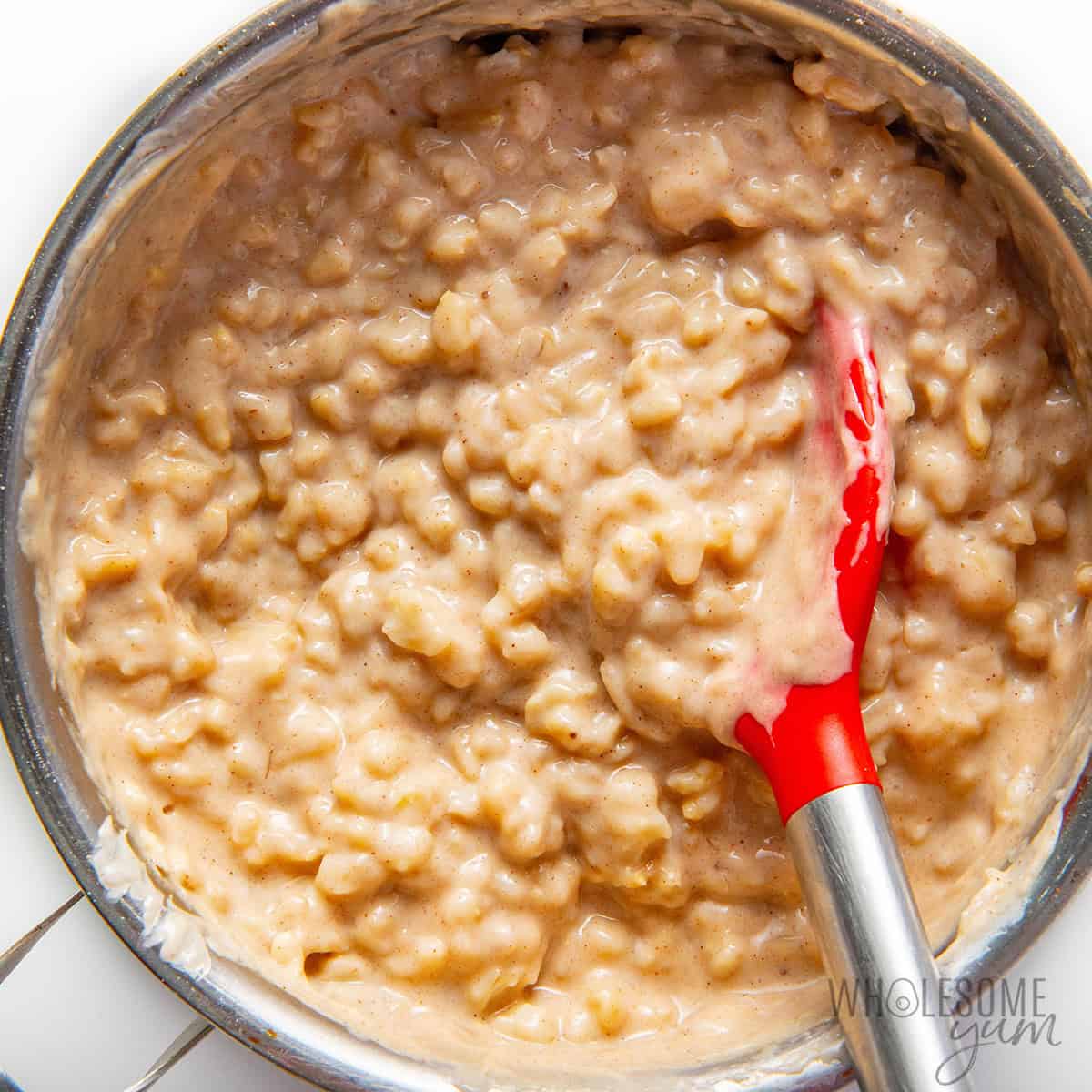 Creamy banana oats mixed together in the saucepan.