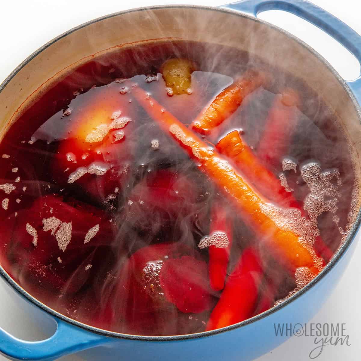 Boiling vegetables in a pot.