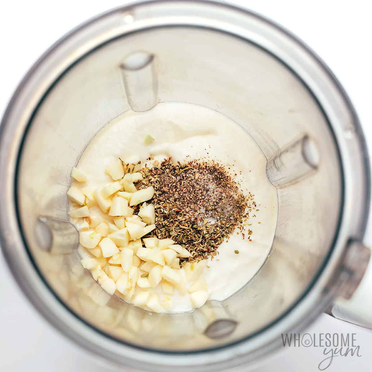 Blending the creamy sauce in a blender.